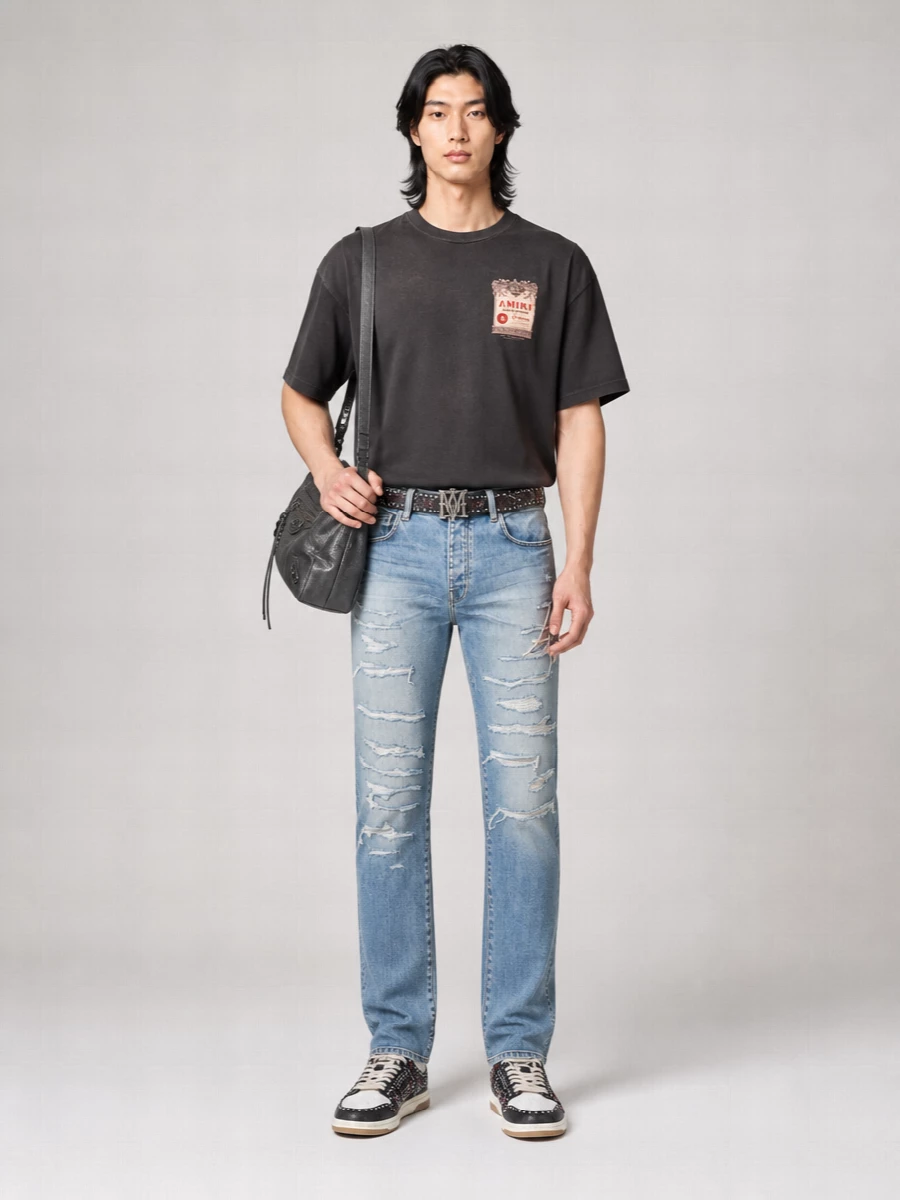 Amiri Slim jeans repaired distressed five pocket | The Fashion Square