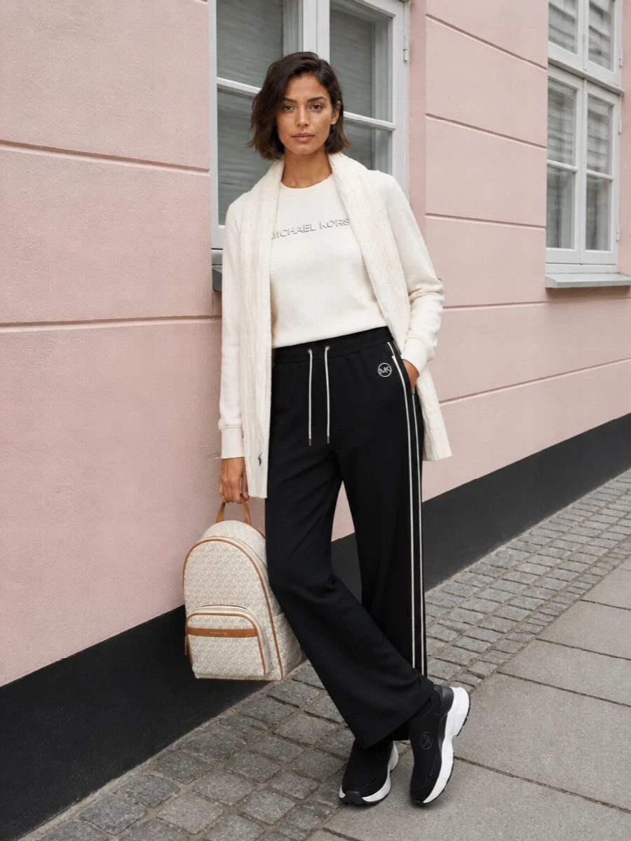 Michael kors ivory sweatshirt black track pants outfit