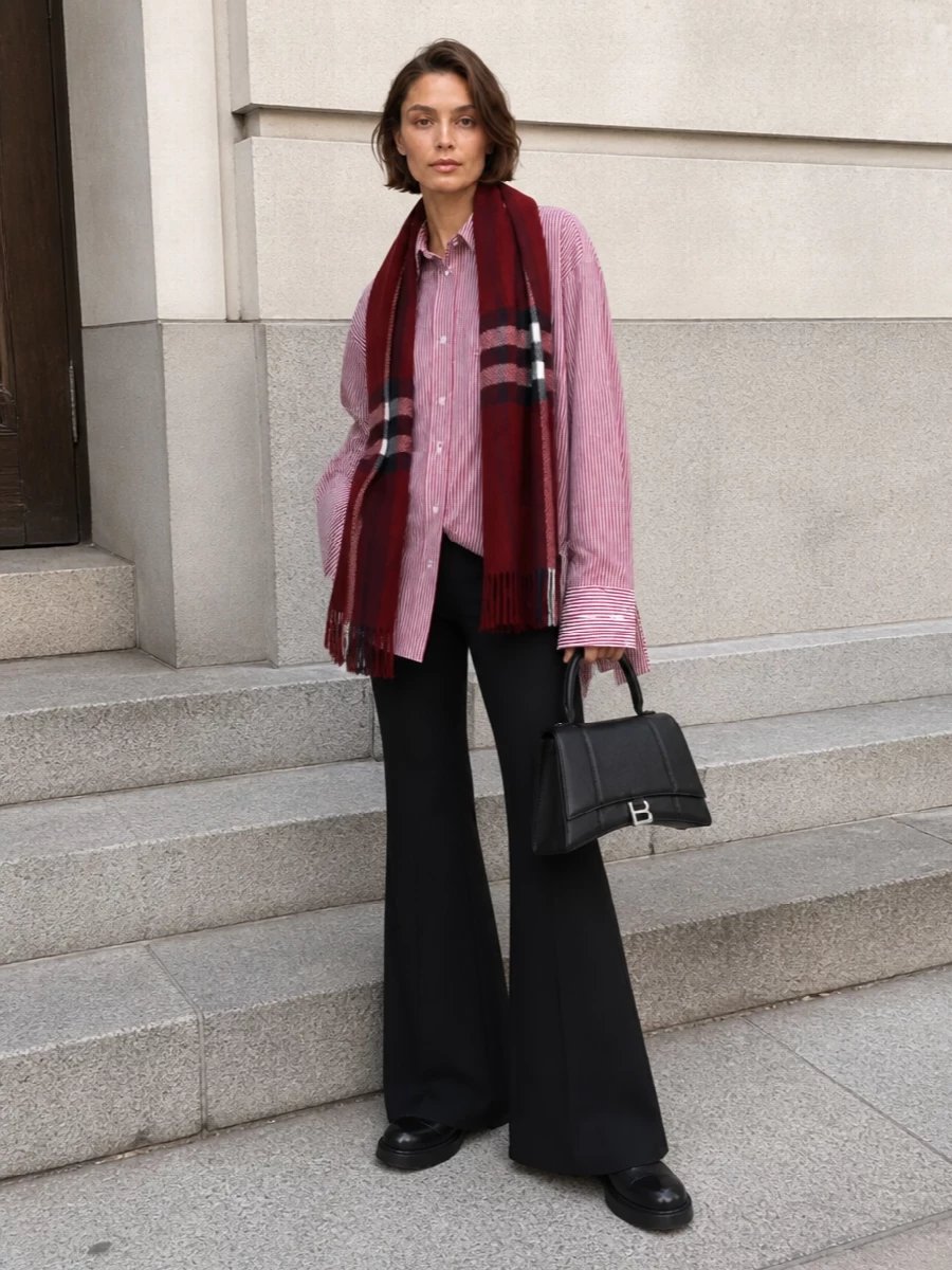 Balenciaga striped shirt flared trouser outfit