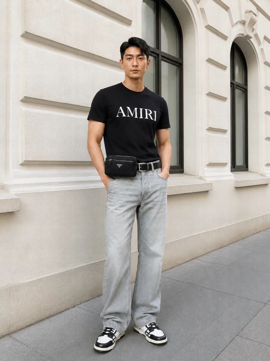 Amiri black logo tee grey jeans outfit