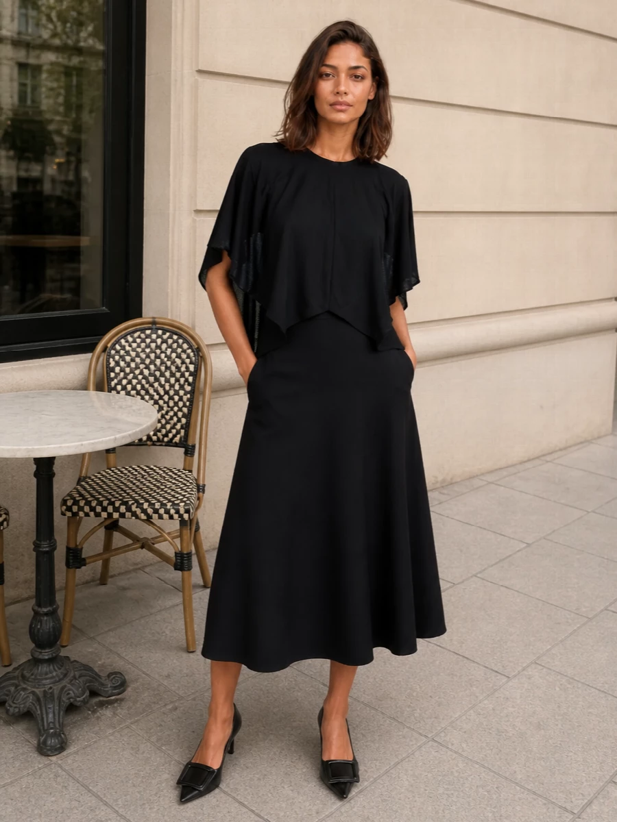 Jacquemus black cape top flared midi skirt outfit