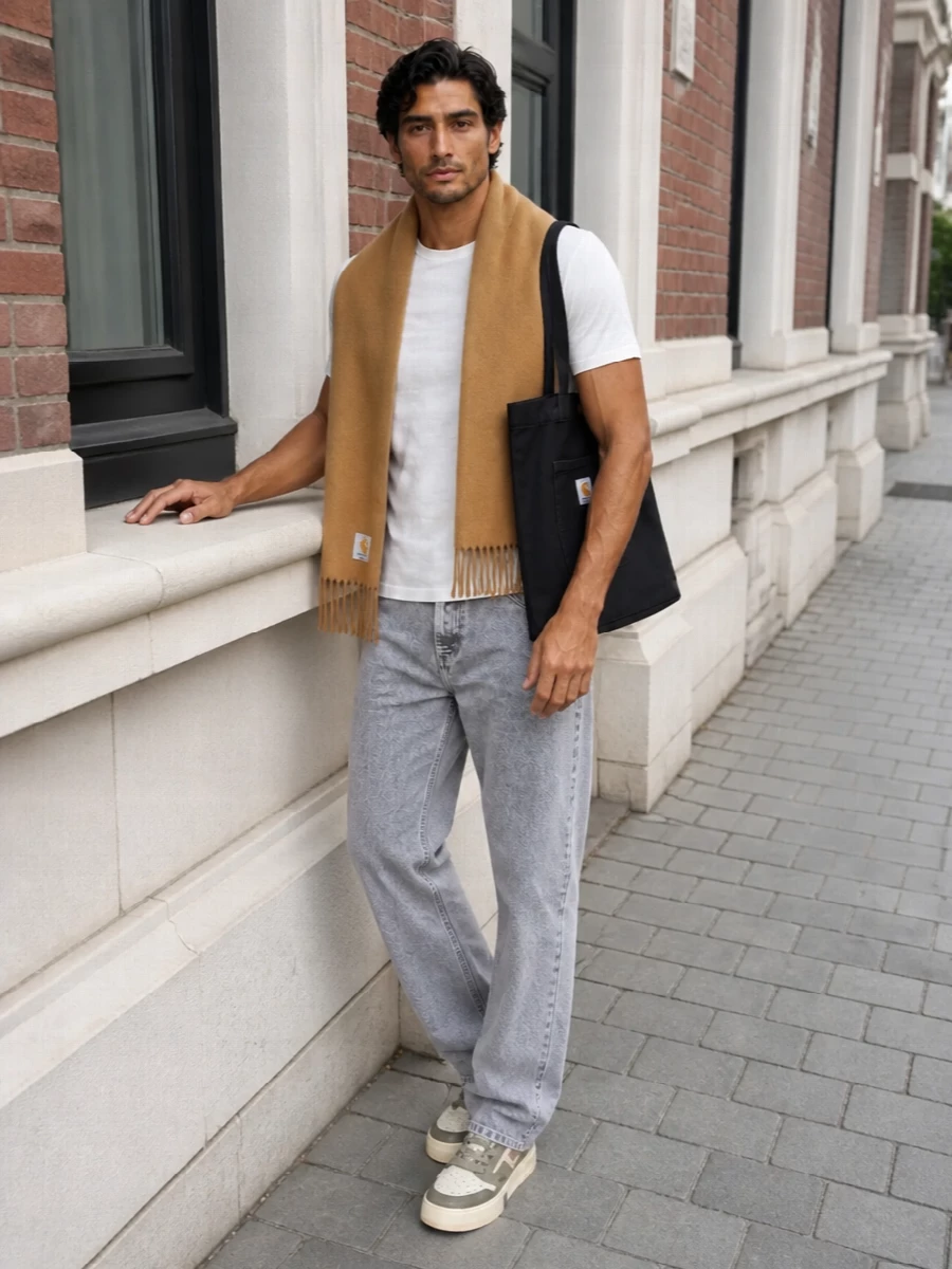Carhartt tee grey jeans represent sneakers outfit