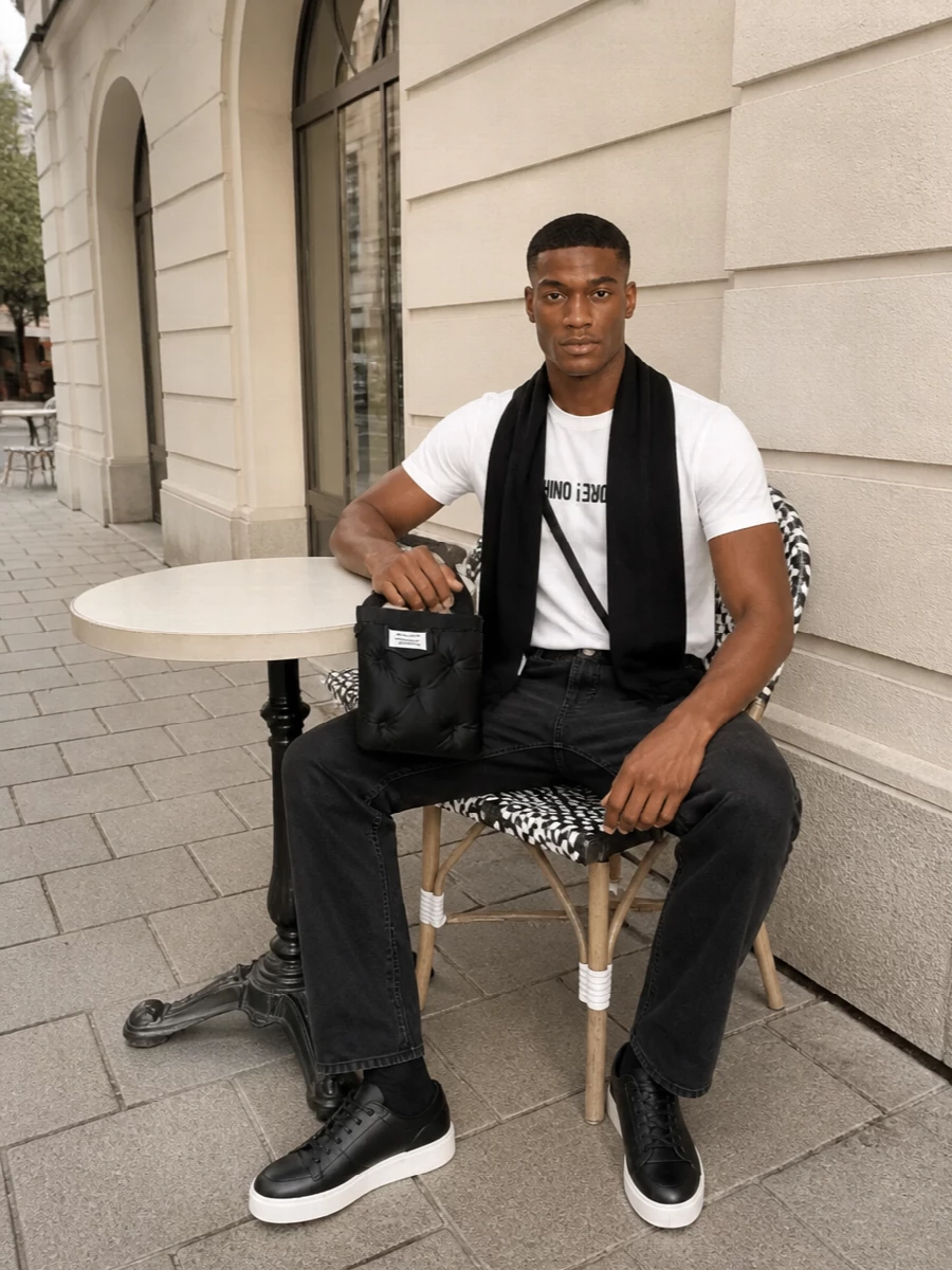 Moschino tshirt black jeans sneakers outfit