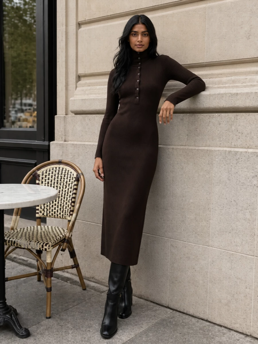 A ribbed chocolate Tom Ford column pairs with the sleek Gucci knee boot for a restrained, body-skimming winter outfit. The long, vertical lines read polished rather than precious, while the deep brown and black palette keeps the mood quietly luxurious and city-ready. This path beats tailoring separates here because it lets the boot’s shape and subtle hardware stay in focus without competing hemlines.
