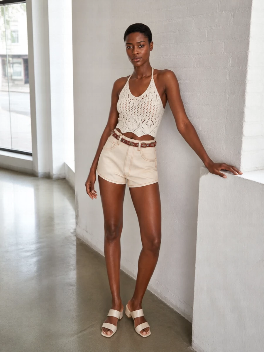 Alanui cream mini shorts crochet top outfit