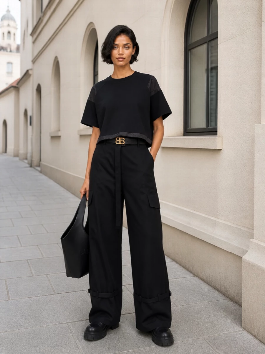 Sacai black cargo trousers cropped tee boots