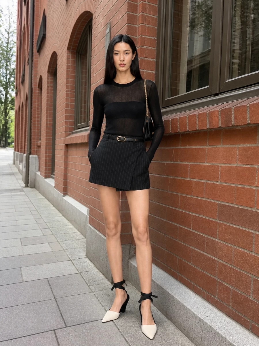 Designer pinstripe mini skirt sheer black top outfit