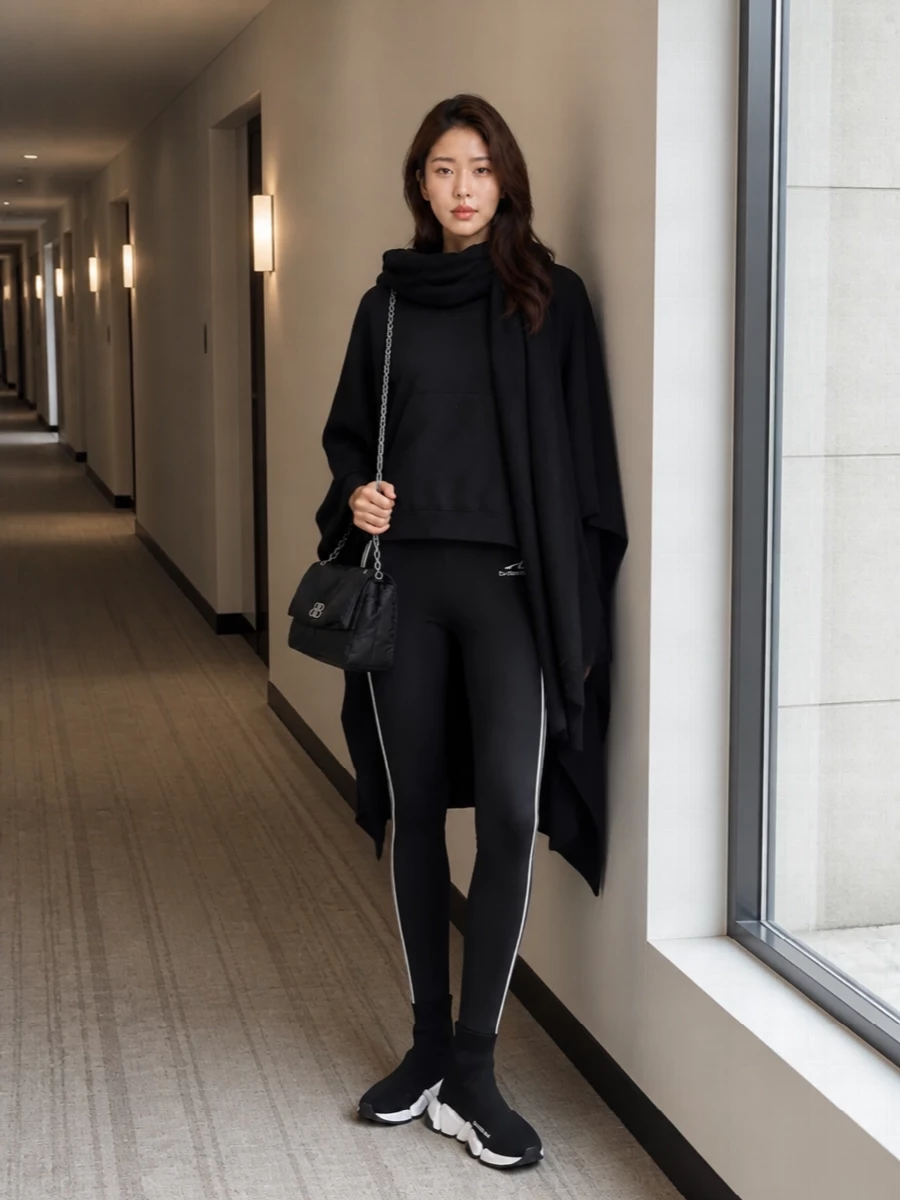 Balenciaga black poncho hoodie with leggings sneakers