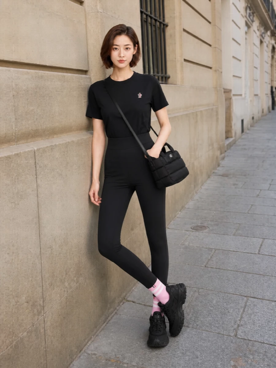 Moncler black tee track pants athleisure outfit