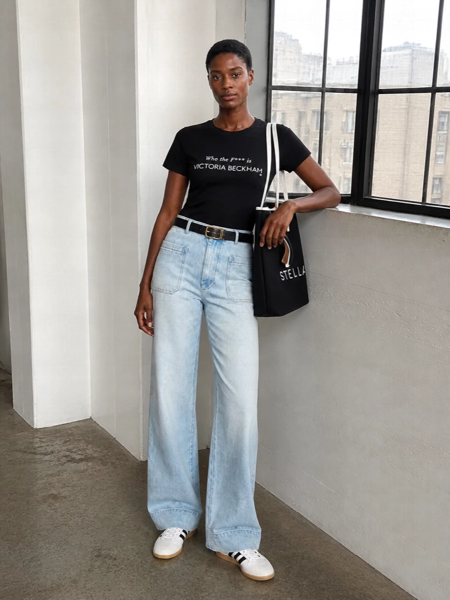 Victoria beckham graphic tee wide leg jeans outfit
