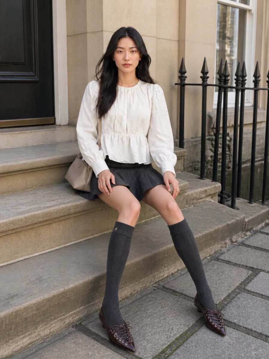 Ganni white blouse pinstripe mini skirt outfit