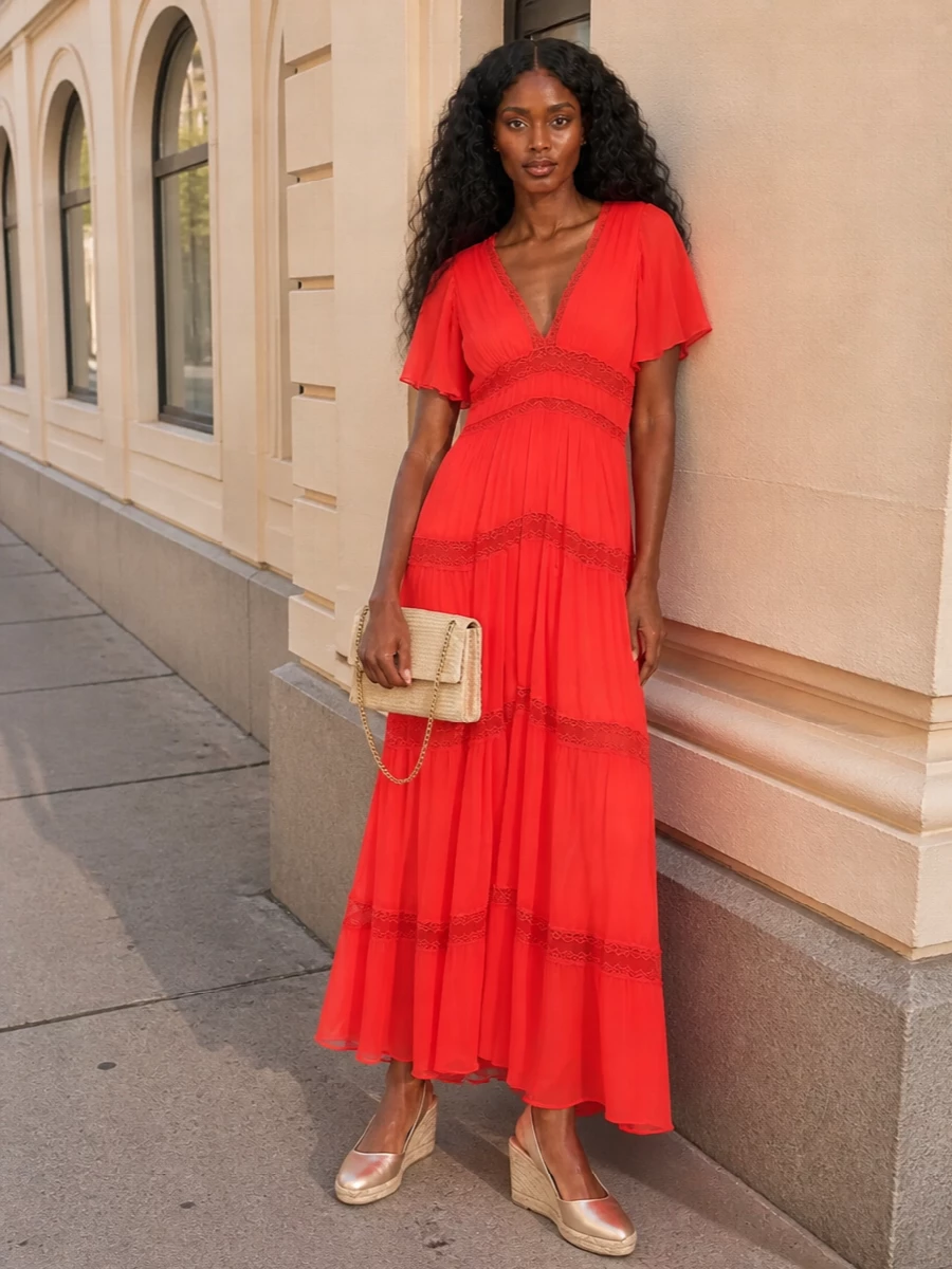 The flowing coral Forte Forte maxi and raffia Tory Burch clutch create a romantic warm-weather ensemble that feels languid and bohemian without losing polish. The champagne espadrille wedges add comfortable height and a subtle metallic sheen, picking up the bag’s gold chain for an easy terrace-to-cocktails finish. I chose the dress route rather than separates because the single sweeping line and lace-trimmed neckline harmonise best with the clutch’s texture and relaxed, summer-party mood.