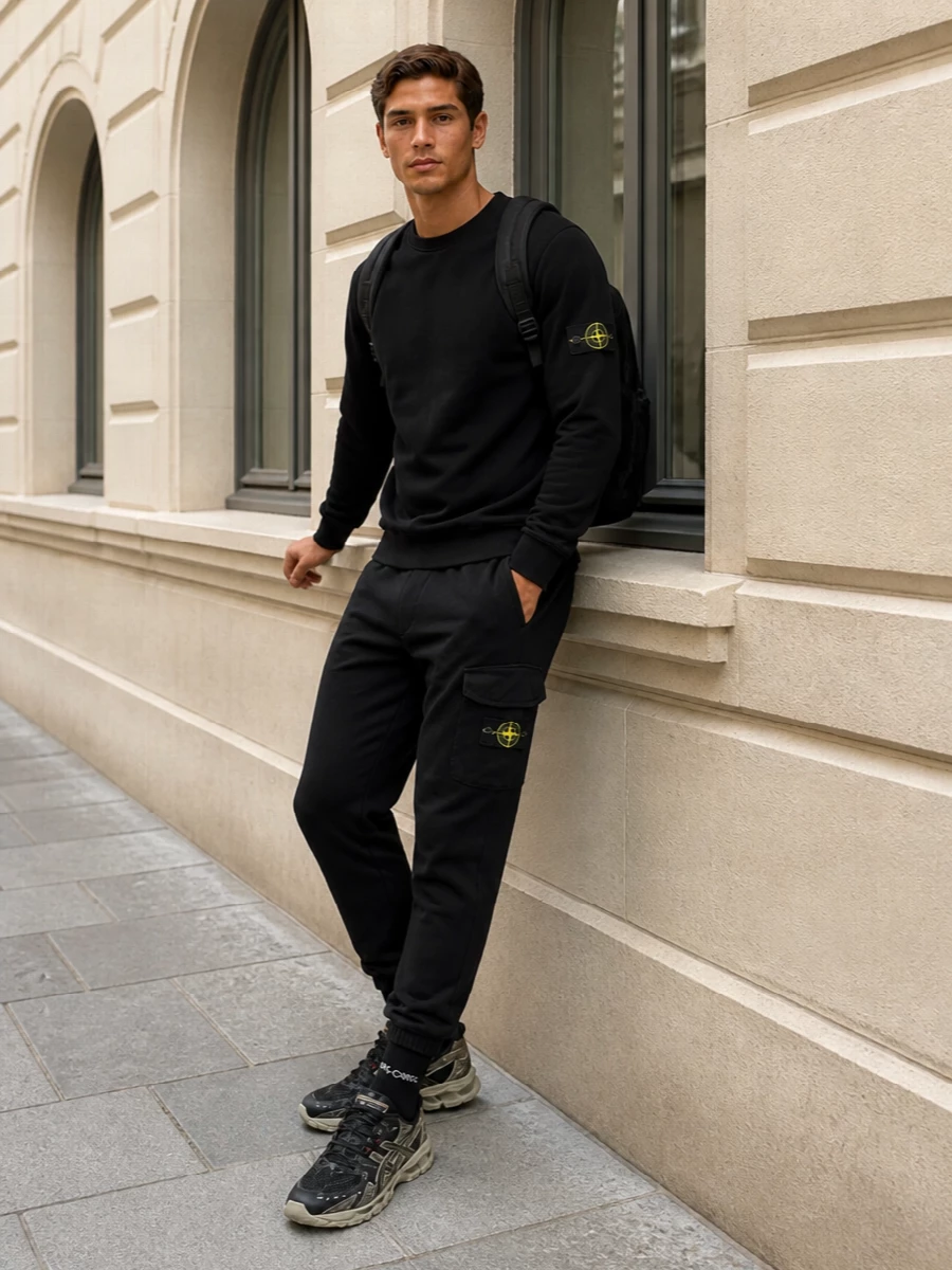 Stone island black joggers technical sneakers outfit