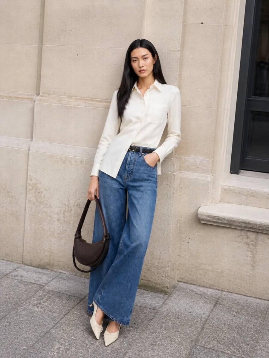Jacquemus wide leg jeans asymmetric ivory shirt outfit