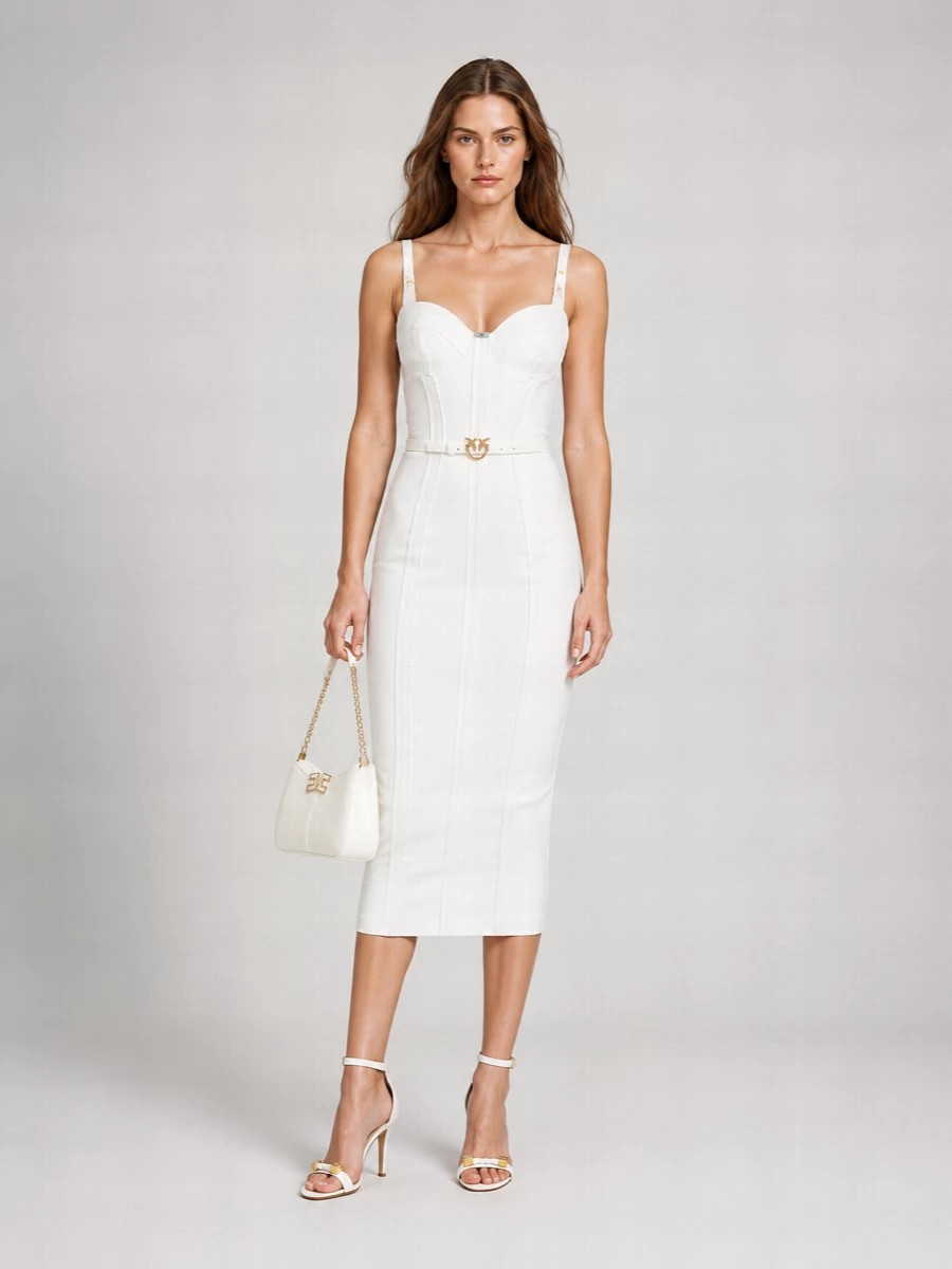 An all-white, body-skimming silhouette that feels sculpted yet fluid, with every detail tuned to gold and clean lines. The stiletto heel and compact baguette keep the proportions long and lean, while the slim belt quietly sharpens the corset waist. Perfect for warm evening cocktails when you want the dress to carry the room with calm confidence.