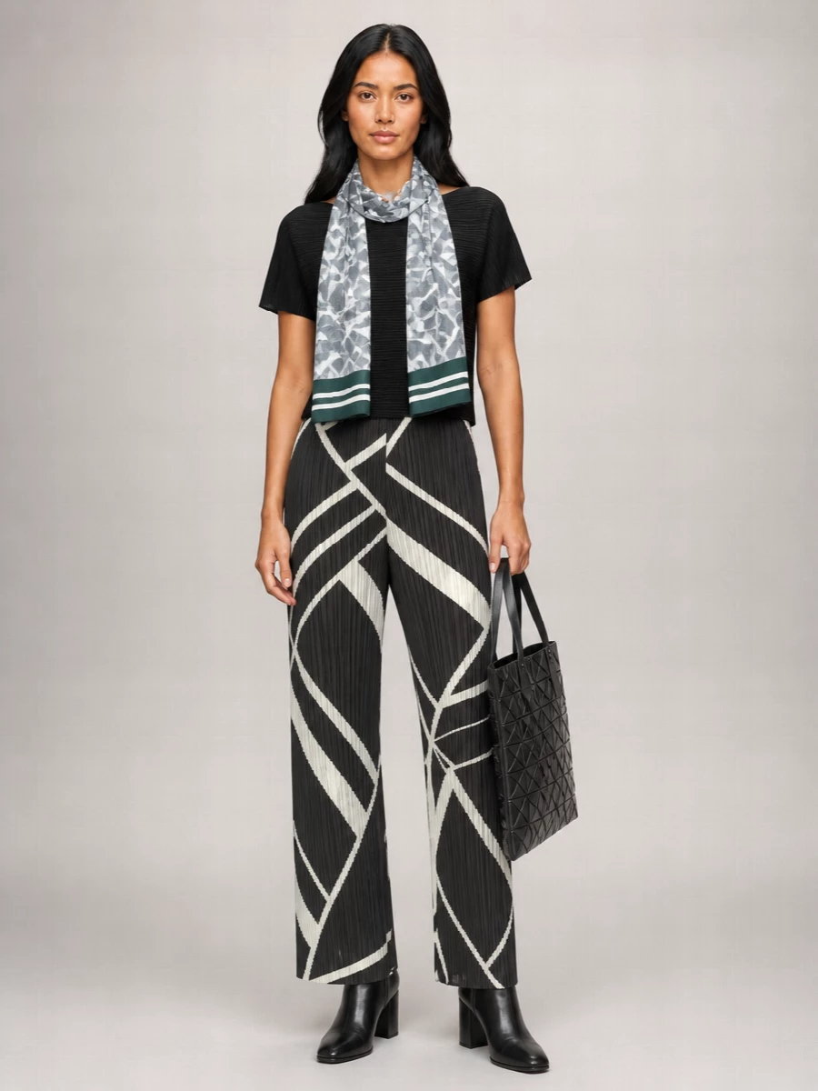 Pleats Please Issey Miyake printed pleated wide-leg trousers