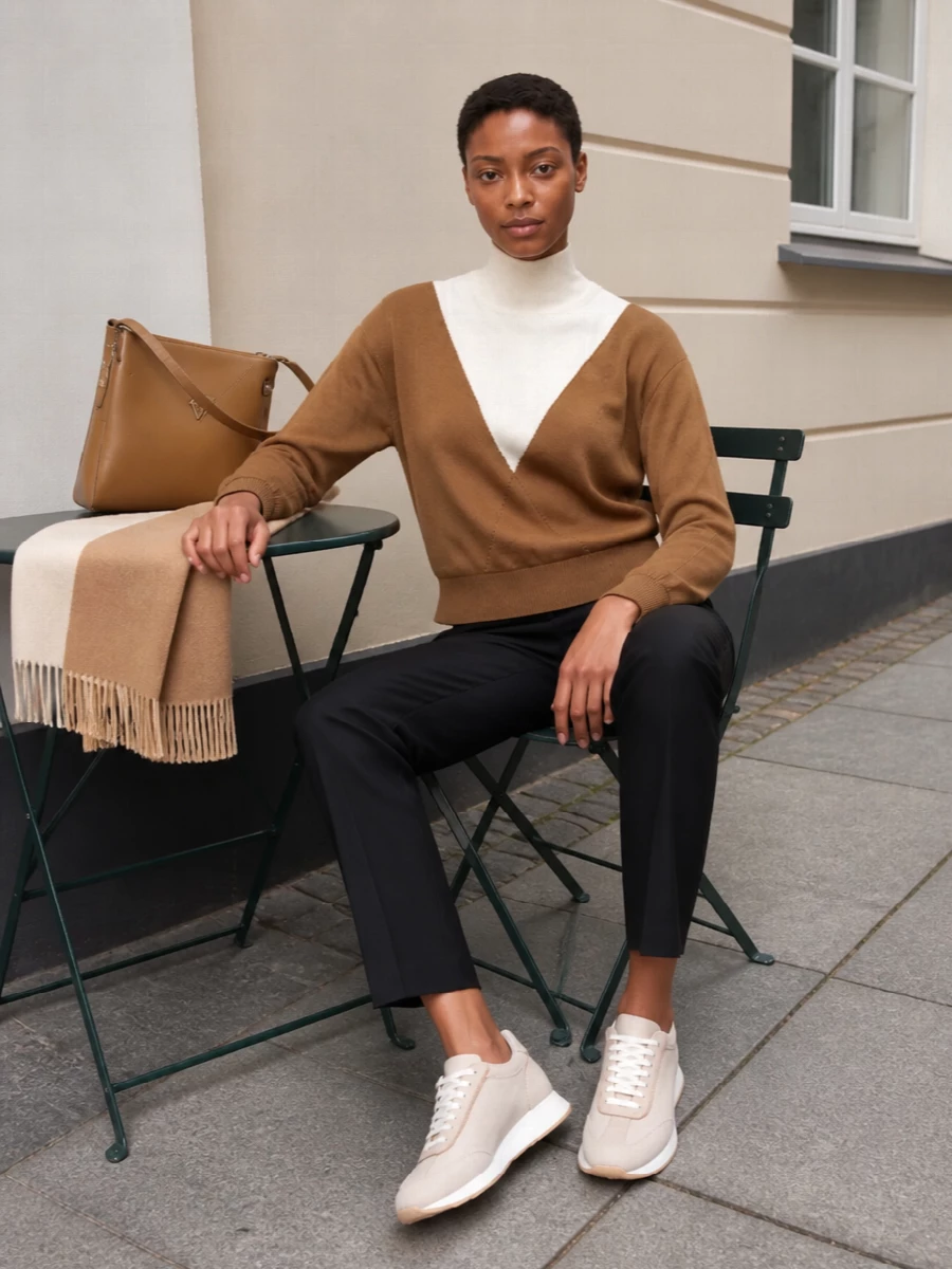 Paco rabanne camel sweater black trouser outfit