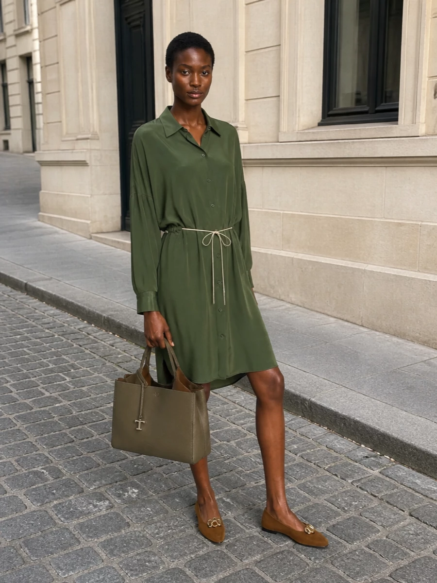 The olive Dries shirt dress and Tod’s tote create a tonal story of deep greens and taupes that feels calm, intelligent and city ready. Warm cognac flats keep the mood understated and luxurious, perfect for days that run from meetings to a late dinner. I chose the dress route over tailoring because the fluid shirting silhouette lets the bag’s structured shape stand out while still reading polished and considered.
