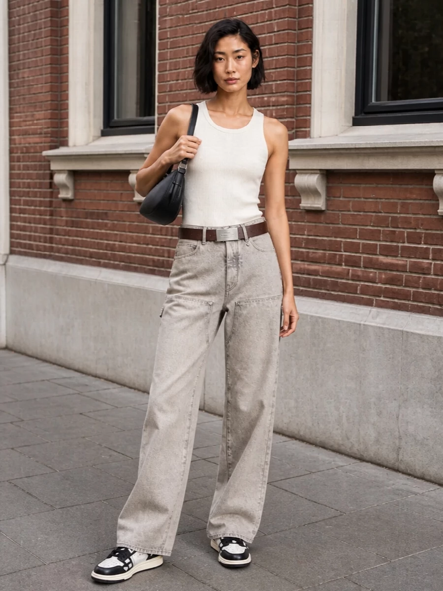 Amiri wide leg jeans cream tank sneakers