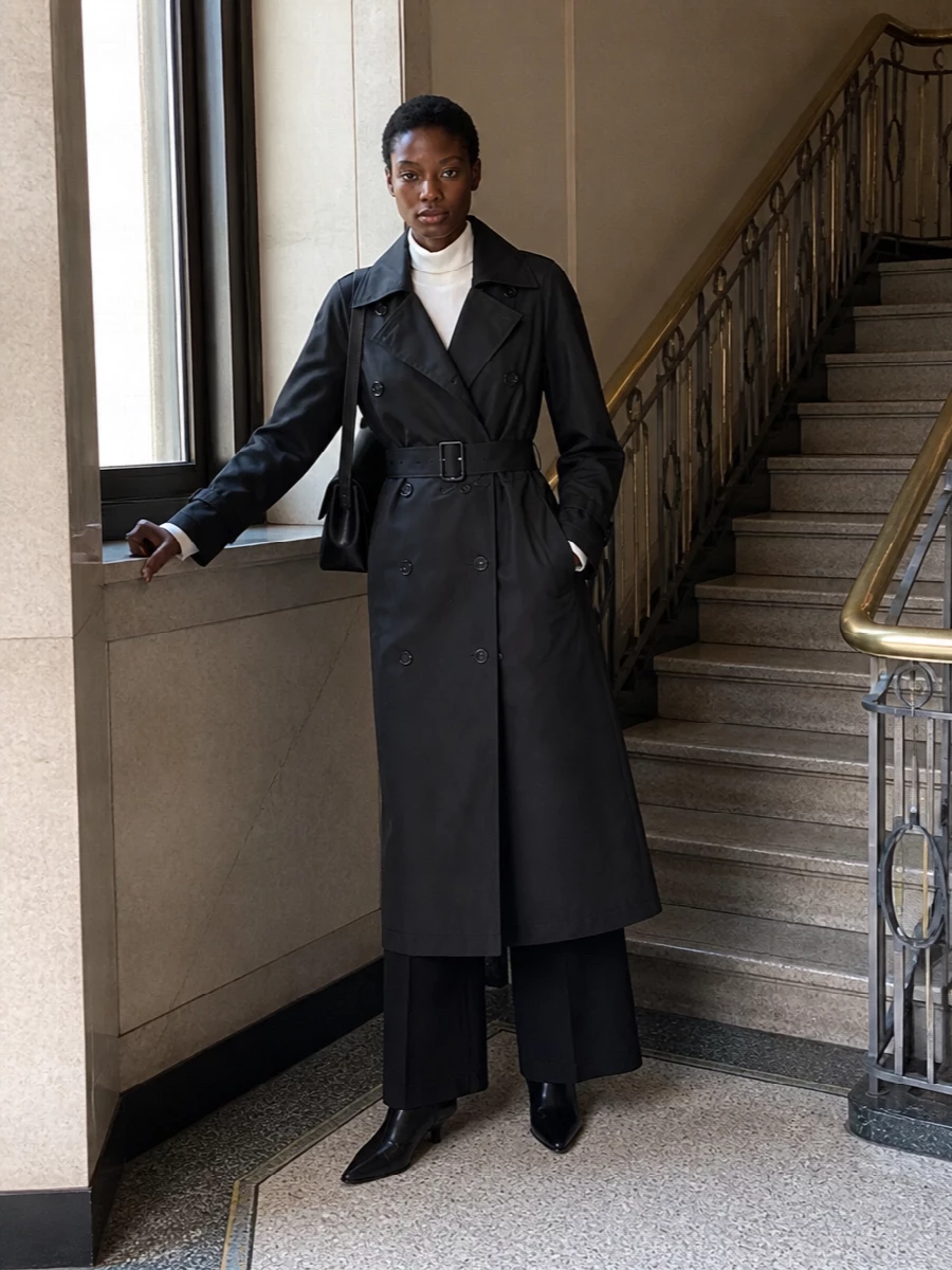Toteme trench ivory turtleneck black trousers