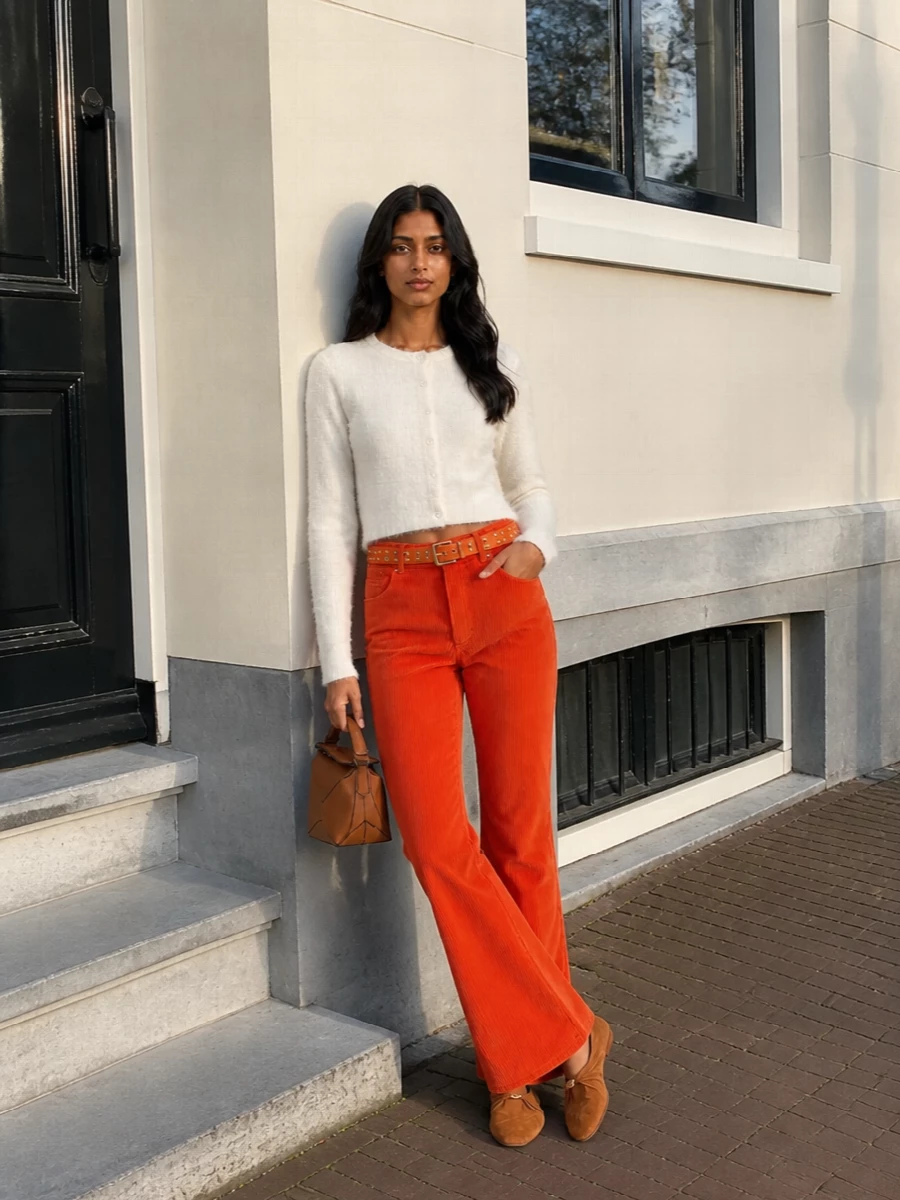 Loewe orange corduroy trousers tan puzzle bag