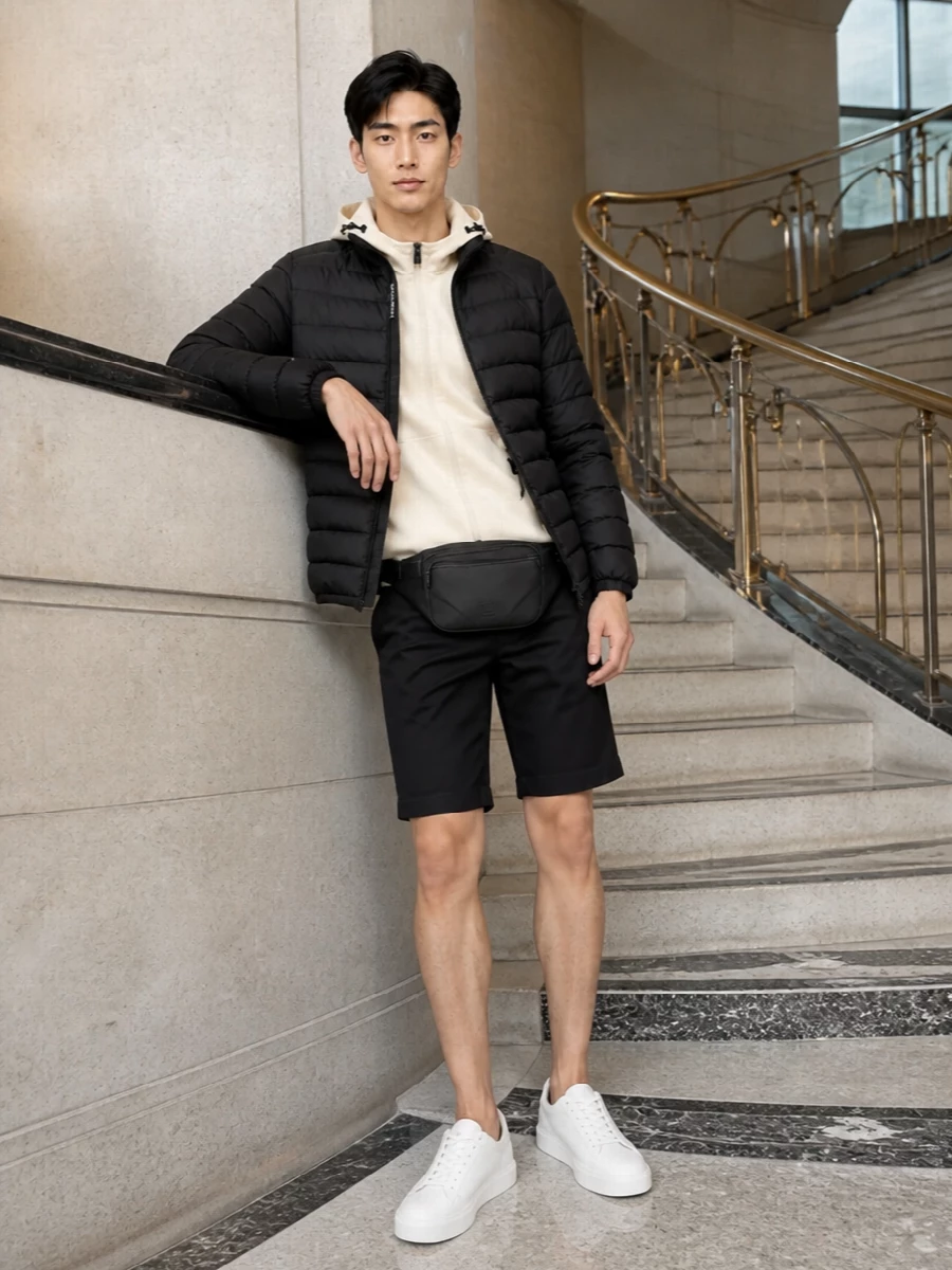 Woolrich black puffer shorts white sneakers