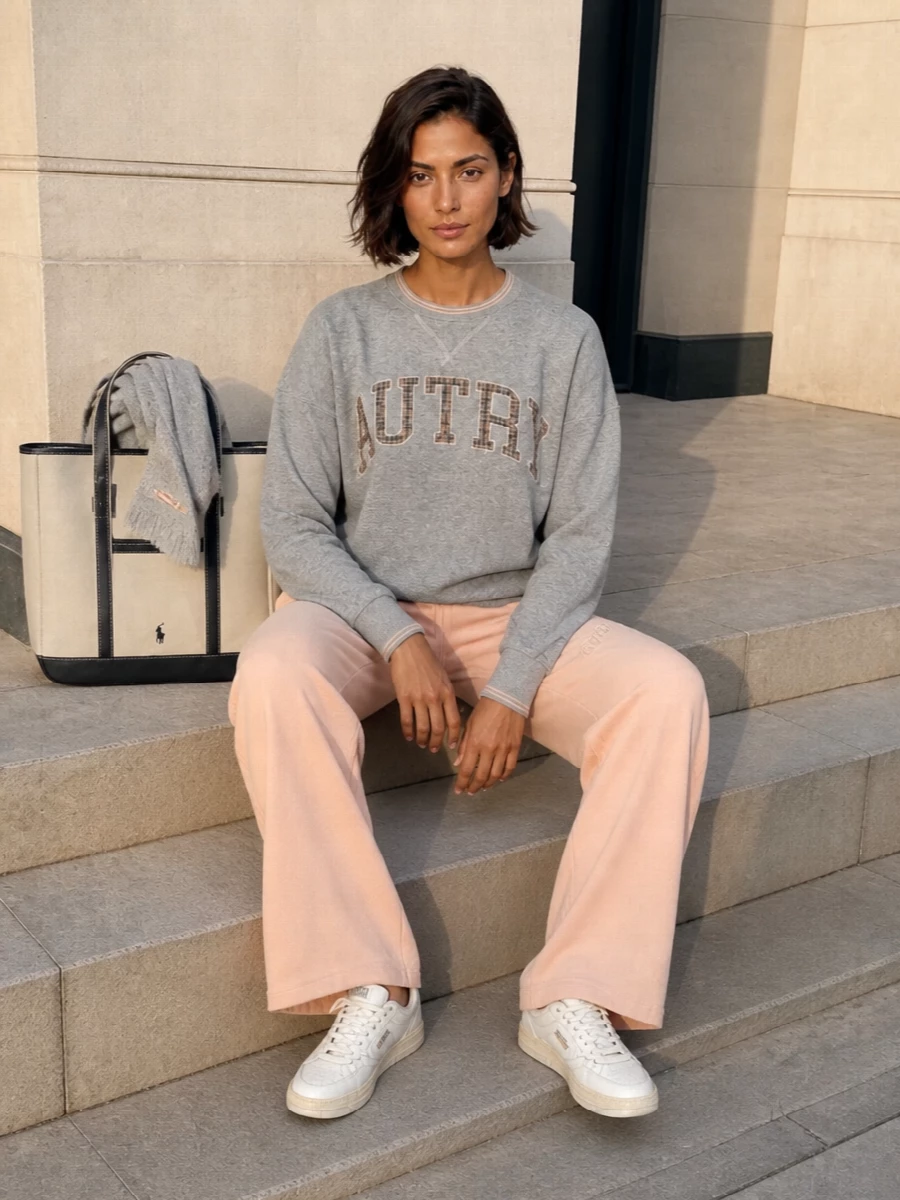 Autry sweatshirt peach sweatpants sneakers outfit