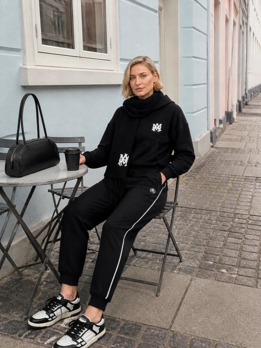 Amiri hoodie track pants miu miu bag outfit