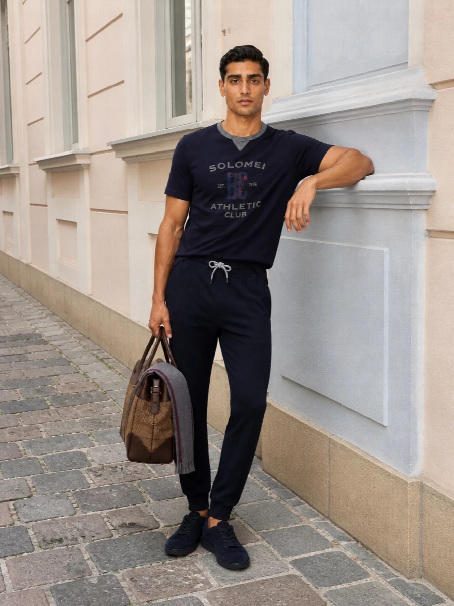 Brunello cucinelli navy joggers suede sneakers outfit
