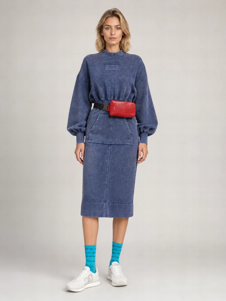 This is a graphic, off duty city ensemble that lets the turquoise D&G socks be the punchline against washed indigo sweatshirt tailoring. The Moschino midi dress and clean retro runners keep the silhouette streamlined, while a lipstick red belt bag brings just enough attitude for weekend roaming or travel days. I chose the dress route so the socks read as a styled highlight rather than disappearing against a matching legging set.