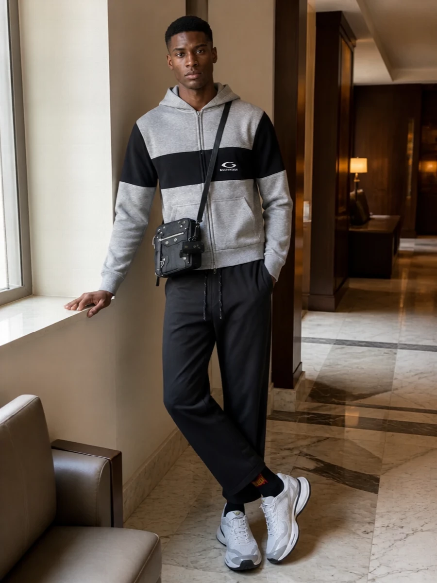 Balenciaga grey hoodie black trousers white sneakers