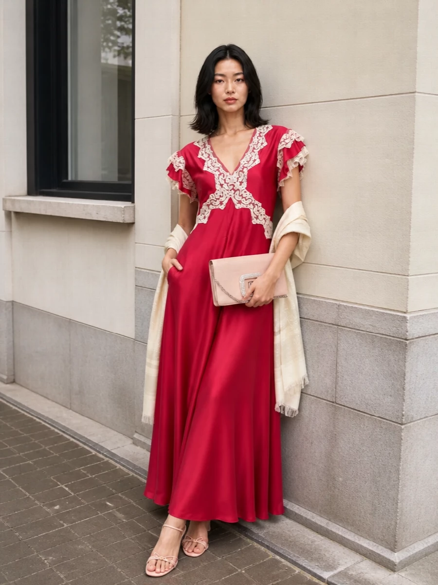 A raspberry satin maxi becomes the evening’s focal point, grounded by barely-there blush stilettos and a crystal-buckled blush clutch. Neutral lace and soft-toned accessories keep the palette luminous and romantic, ideal for candlelit dinners or summer celebrations. The result feels polished yet gentle, with every element supporting the dress’s movement and vintage charm.
