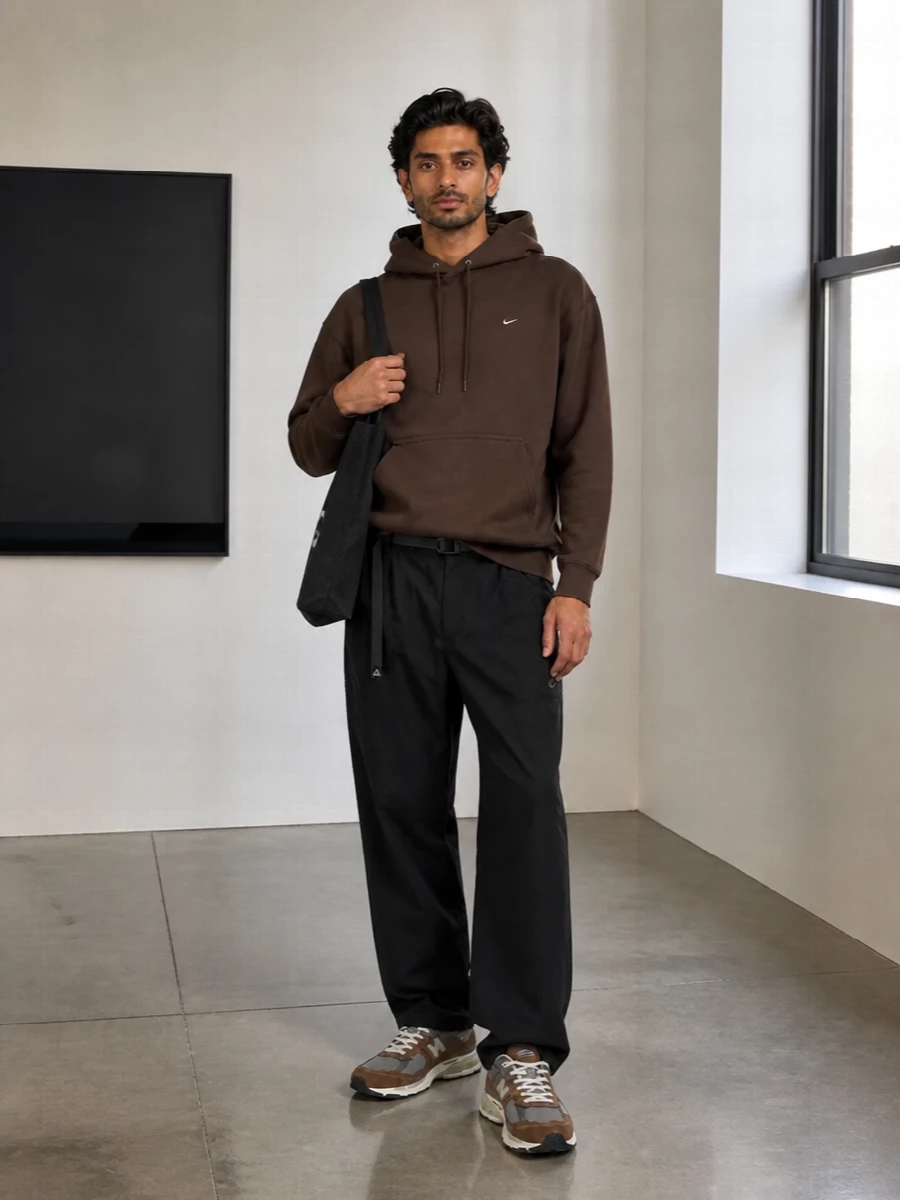 Nike brown hoodie black pants new balance sneakers