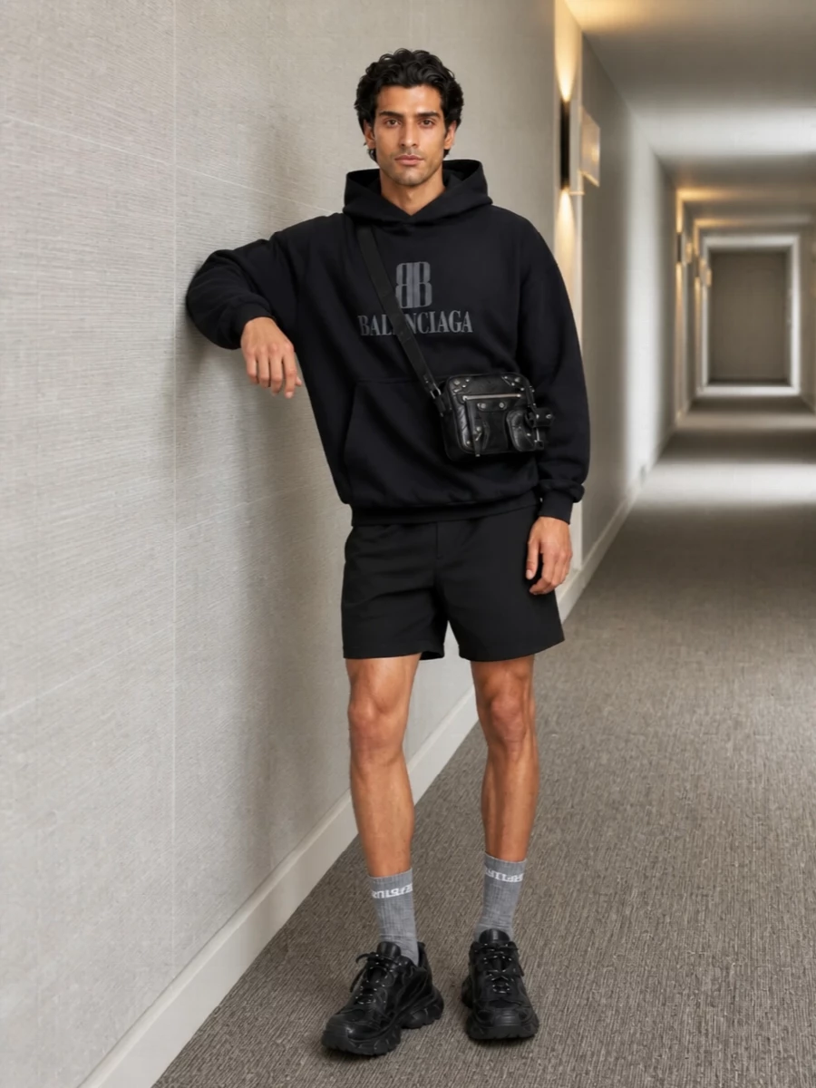 Balenciaga black hoodie track shorts outfit