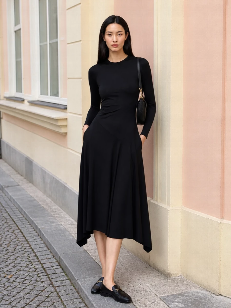 I chose the dress path, as a single sculpted black midi with clean asymmetry best echoes the slim, structured Vivienne Westwood cardholder and keeps the story firmly in polished, urban tailoring. The Victoria Beckham dress, pointed Tod’s flat and Wandler’s sculptural shoulder bag read as one continuous line of quiet precision, ideal for days that run straight into late dinners. Black-on-black hardware and minimal branding keep the focus on cut, proportion and movement rather than decoration.