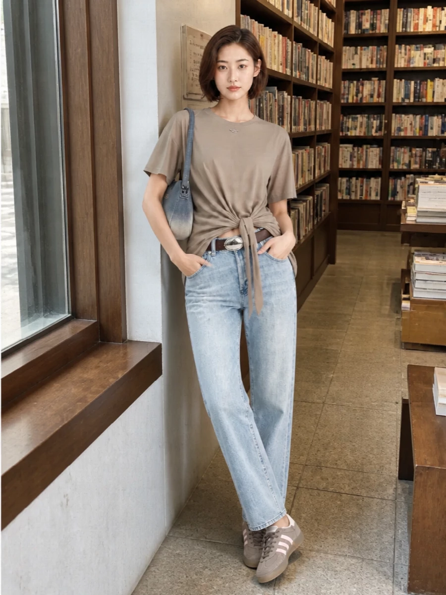 Diesel taupe draped tee light wash jeans outfit