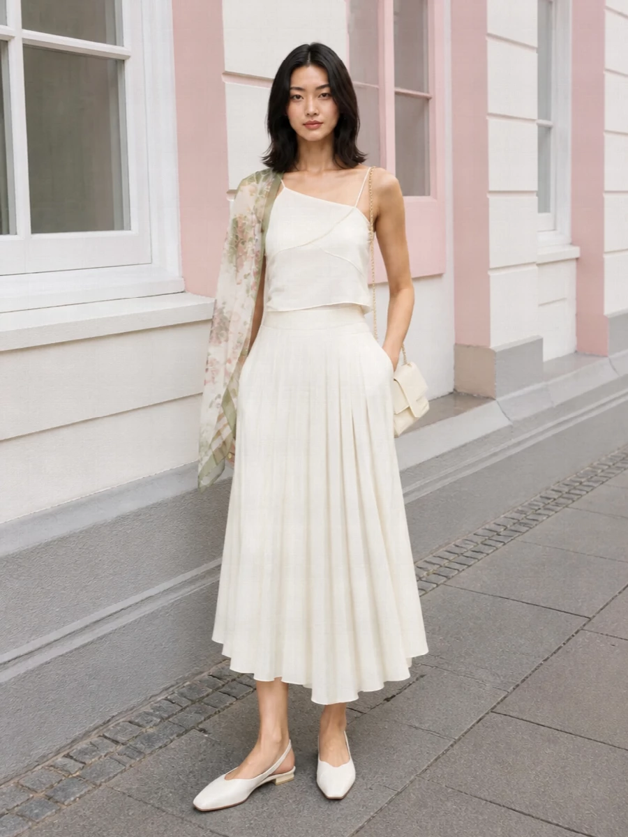 Jacquemus ivory pleated skirt mm6 camisole outfit