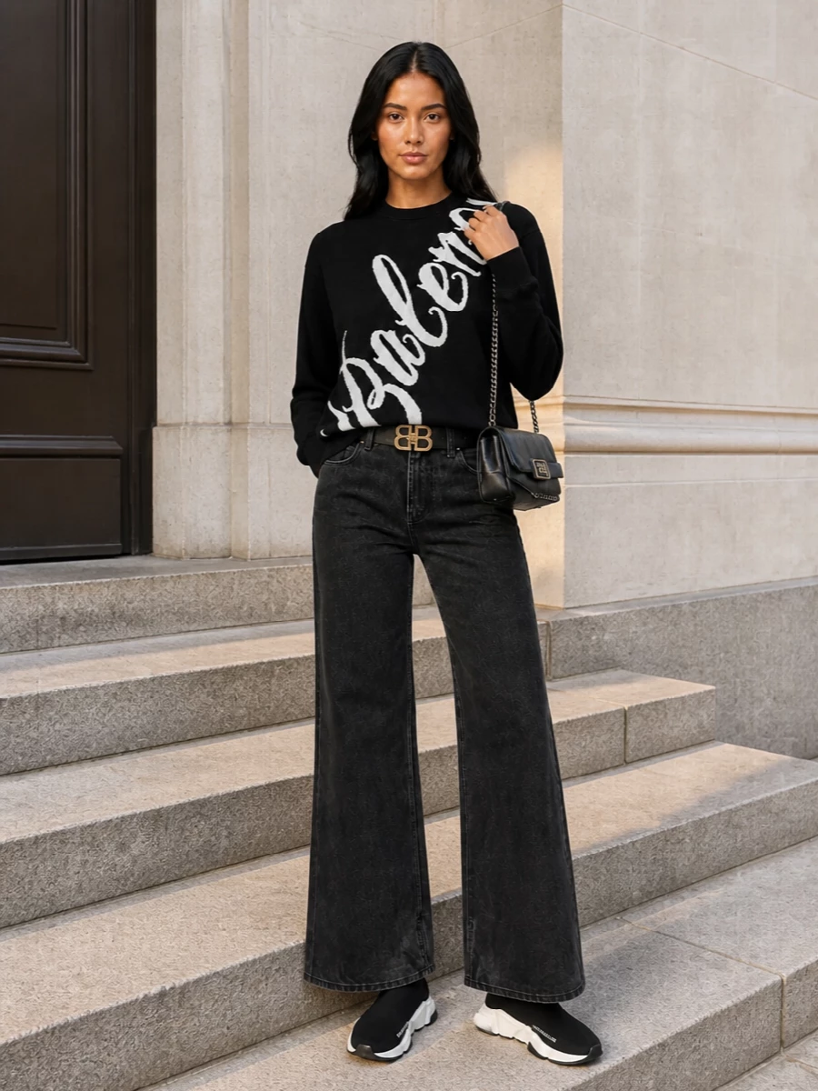 Balenciaga black logo sweater wide leg jeans outfit