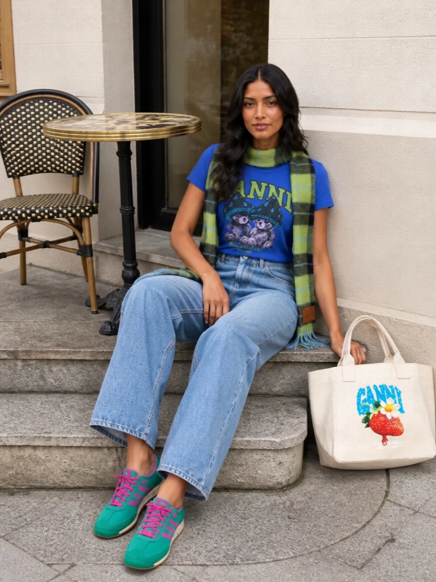 Ganni graphic tee wide leg jeans adidas runners