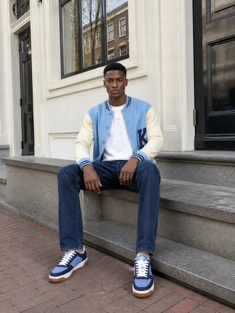 Kenzo varsity cardigan dark jeans outfit