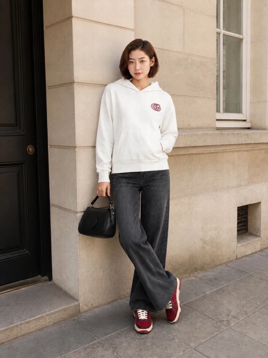 Gucci white logo hoodie wide leg jeans outfit