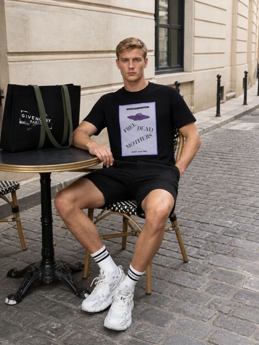 Undercover graphic tee black tailored shorts outfit