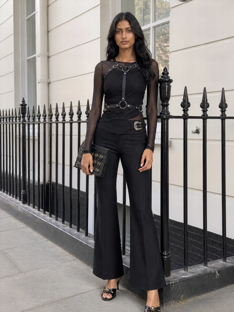 Versace mesh top black flared pants outfit