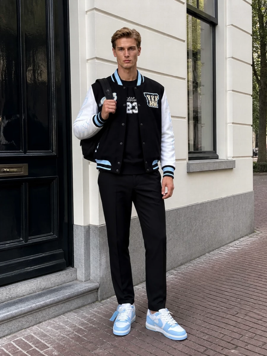 Off white varsity jacket blue sneakers outfit
