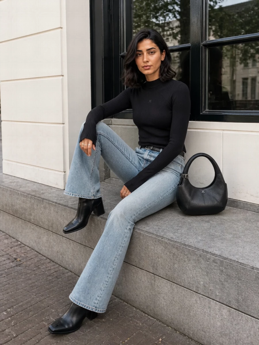 Courreges flared jeans black ribbed top outfit