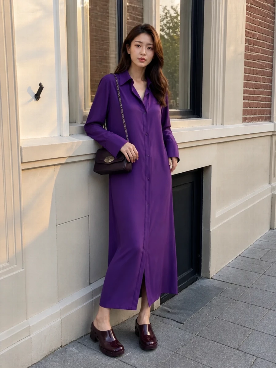 The Attico’s fluid purple shirt dress lets the Bottega plum mules take center stage, creating a long, graphic column of color with a subtle y2k attitude. The saturated tones stay within the same berry family so the hardware on the shoes and bag feels cohesive rather than fussy. Opting for the dress route keeps the silhouette simple yet directional, ideal for warm city evenings or gallery dinners where impact matters but ease is non‑negotiable.