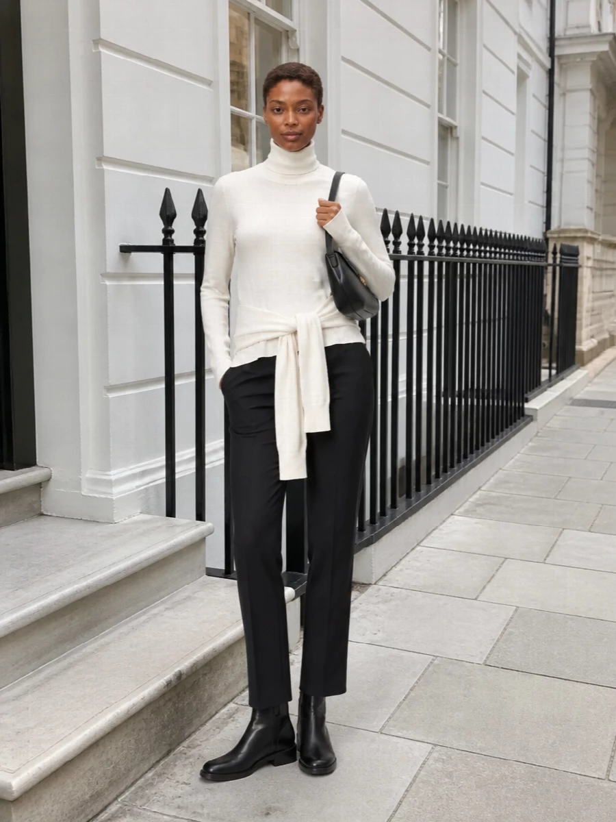 Toteme ivory turtleneck charcoal trousers outfit