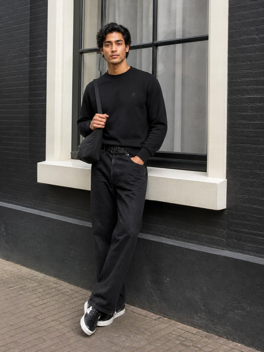 Golden goose black sweatshirt relaxed jeans outfit