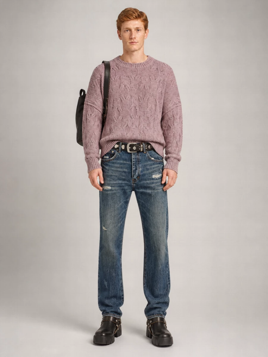 Straight-leg distressed denim and a mauve cable knit set a laid-back rock mood in a muted, cold-weather palette. Chunky Diesel boots and a studded belt give the softness some grit, while the washed leather backpack keeps everything feeling considered and ready for the city.