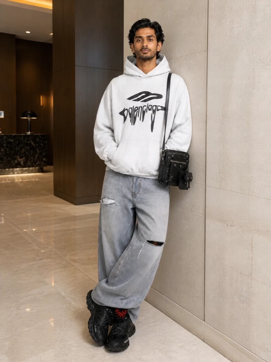 Balenciaga hoodie wide leg distressed jeans outfit